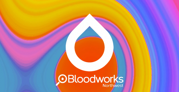 A rainbow-colored swirly background with white outline of a raindrop. Inside the raindrop is a QR code, linking, to bloodworksnw.org