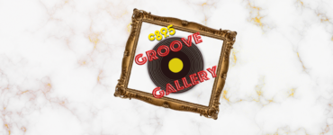 An ornate golden frame displaying the logo 'Groove Gallery,' styled as a black vinyl record with a yellow center, set against a marble background.