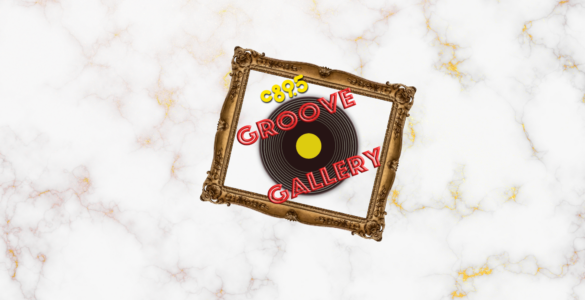 An ornate golden frame displaying the logo 'Groove Gallery,' styled as a black vinyl record with a yellow center, set against a marble background.