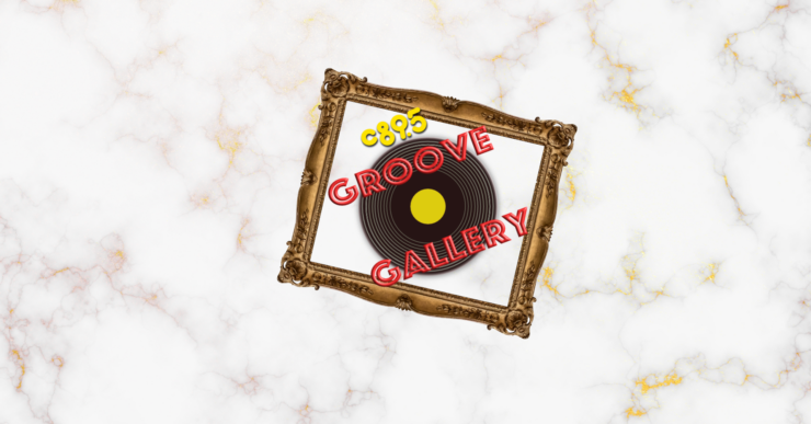 An ornate golden frame displaying the logo 'Groove Gallery,' styled as a black vinyl record with a yellow center, set against a marble background.