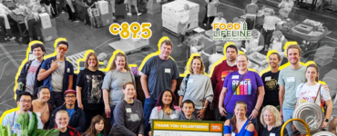 Group of volunteers at Food Lifeline, smiling and posing in a warehouse setting surrounded by boxes and canned goods, with a banner displaying gratitude and statistics about volunteer efforts.