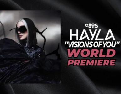 Promotional banner featuring the artist Hayla at the world premiere of "Freefall," highlighted by the C895 logo, set against a sleek, dark background with shimmering textures.