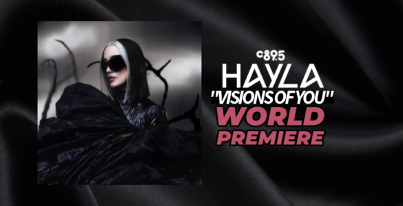 Promotional banner featuring the artist Hayla at the world premiere of "Freefall," highlighted by the C895 logo, set against a sleek, dark background with shimmering textures.