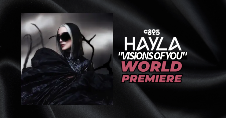 Promotional banner featuring the artist Hayla at the world premiere of "Freefall," highlighted by the C895 logo, set against a sleek, dark background with shimmering textures.