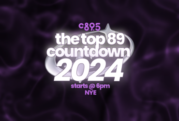 Promotional banner for "The Top 89 Countdown 2024" hosted by C895, starting at 6 PM on New Year's Eve, set against a swirling purple background.