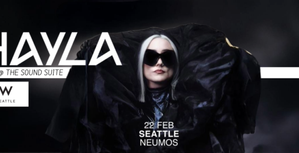 Promotional banner featuring the artist HAYLA, announced to perform live at The Sound Suite, W Seattle, on February 22 at Neumos. The image shows HAYLA wearing a large black outfit and sunglasses, set against a dark background.