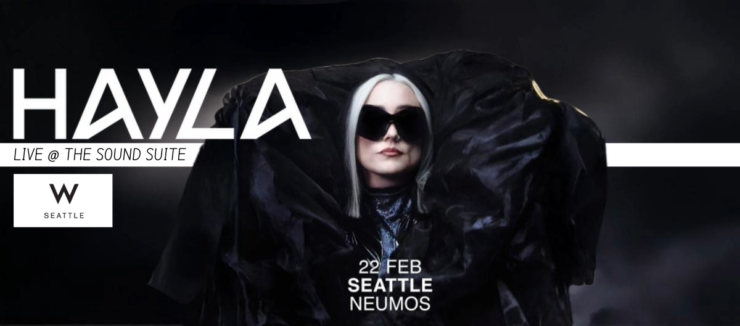 Promotional banner featuring the artist HAYLA, announced to perform live at The Sound Suite, W Seattle, on February 22 at Neumos. The image shows HAYLA wearing a large black outfit and sunglasses, set against a dark background.